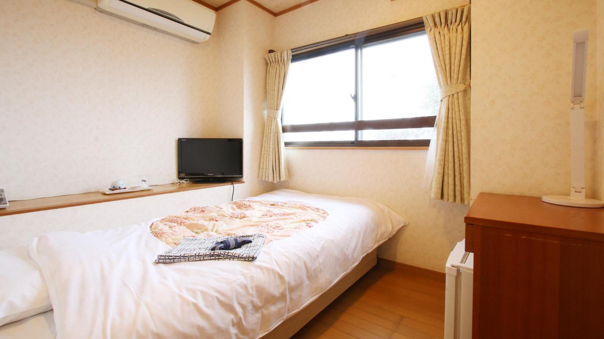 Business Hotel Furusato Ibusuki Buitenkant foto